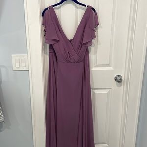 Flutter sleeve long full skirt bridesmaid’s dress by David’s Bridal.